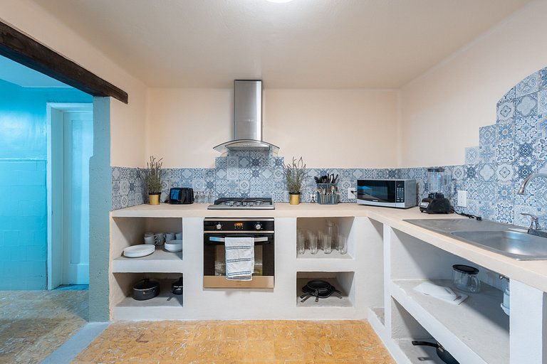 Casa céntrica con 4 habitaciones y estacionamiento