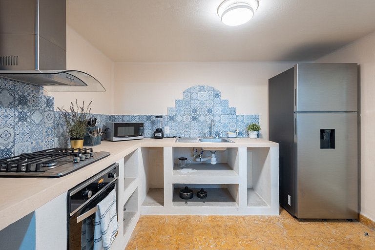 Casa céntrica con 4 habitaciones y estacionamiento